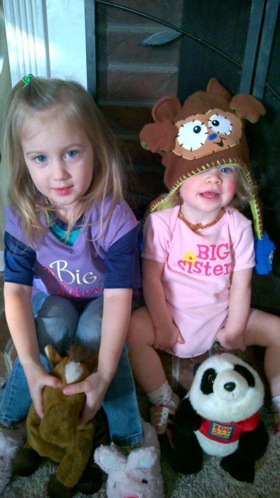 Honora and Rosalyn wearing Big Sister shirts